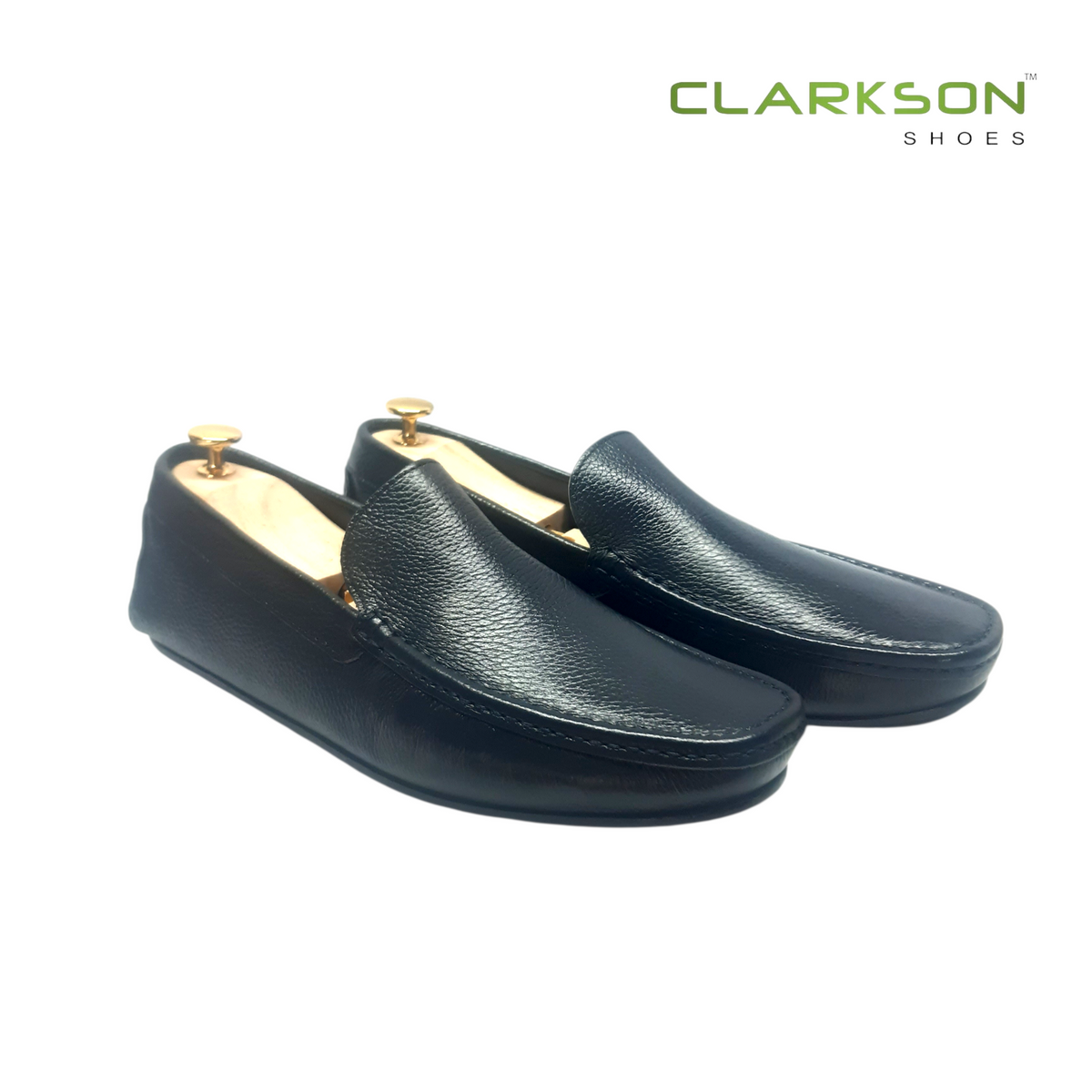 Clarkson Athens navy blue hand-crafted leather penny loafers with a squared toe and lightweight Argentinian sole.